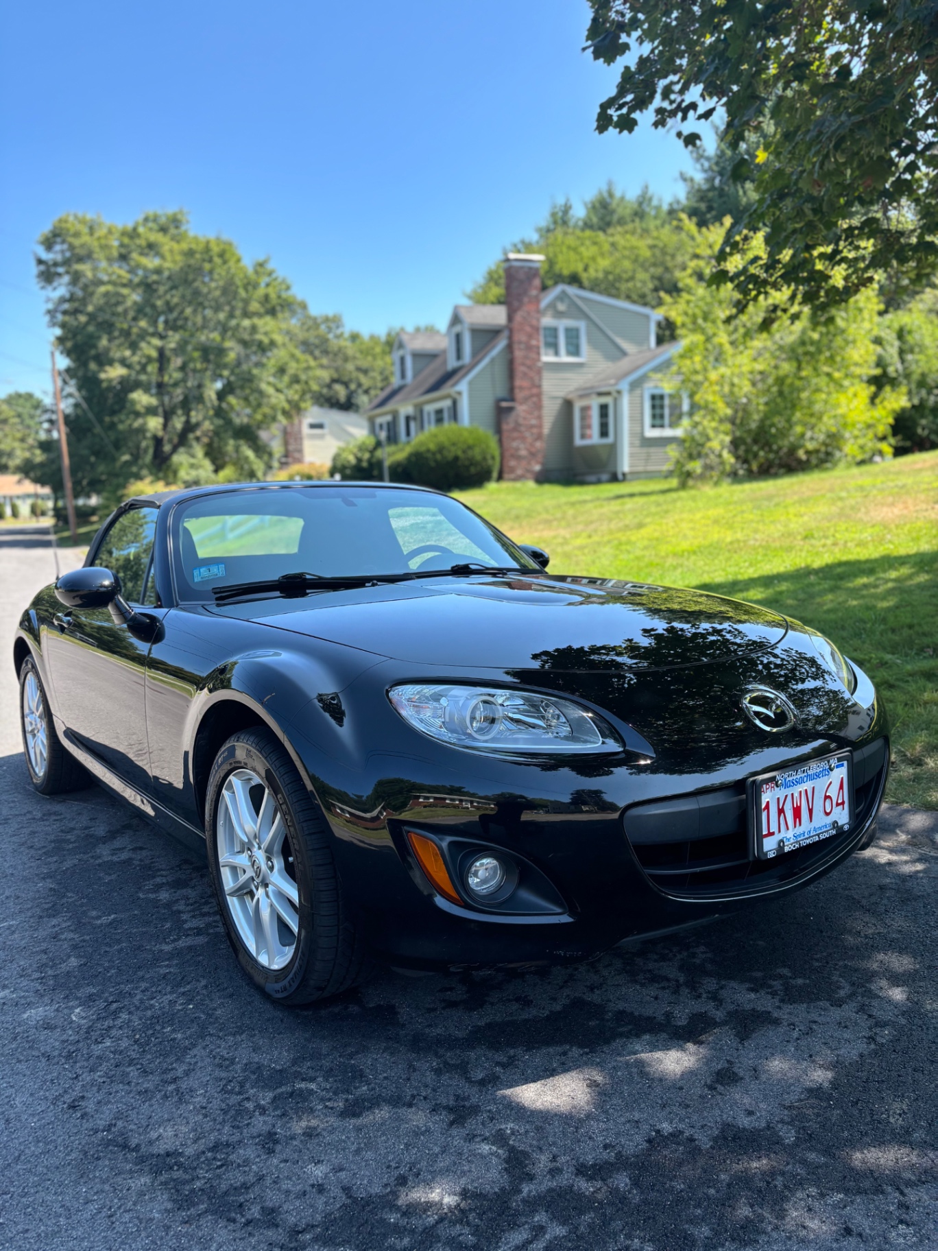 Black Mazda Miata after a full detail